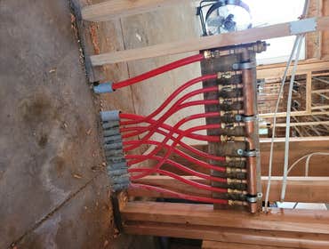 Photos by Top of the West Plumbing #2 5 bathroom, 2 kitchen, 2 laundry rooms. Hydronic floor heating throughout.