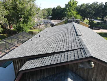 Photos by Tactical Construction Group LLC #1 Remove and reinstall a new shingle roof, tapered flat roof, and demo solar pool heaters and solar water he