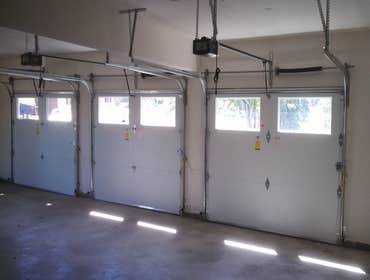 Garage doors and openers installed