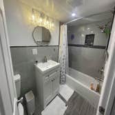 Photos by Hercules Bros LLC #1 Full bathroom addition to basement