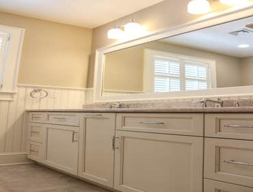 Baine Contracting Inc Project Multiple jobsites - showing kitchens, interior and exterior trim work, new homes, bathrooms, tile work, wood and iron ra