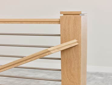 Photos by San Clemente Woodworking #1 Stainless Steel horizontal rods with our custom shadow posts. Clean lines and modern design.
