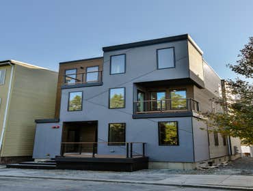 Photos by Urbanity Homes #1 Maverick St Boston MA
The Maverick Street condos are a study in materials. Simple geometries are given interest with contra