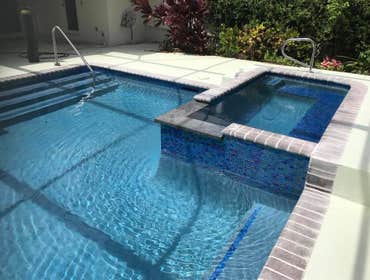 Photos by Oasis Pools and Pavers #1