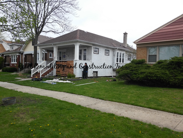 New stucco and exterior paint with new wooden short fence. Removed or stucco and re stucco with new exterior paint, sand paint stairs and install short