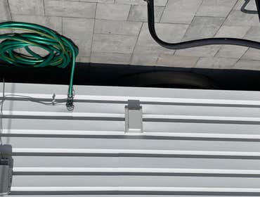 Photos by Dukes Pro Electric #6 Oldwork receptacles in siding on patio