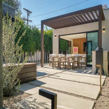 ADU Conversion We transformed an unused backyard and garage into a beautiful oasis for a client. A welcoming open floor plan with custom white oak pane
