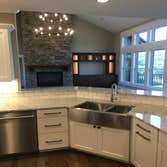 Photos by Thomas Elliott #1 2100 sf home with partially finished pre-cast concrete basement. This home has wood flooring, custom woodwork, tile and cab