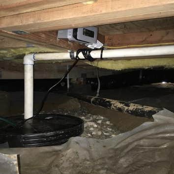 Sump Pump Installation Our customer had standing water under their house that was hindering the sale of their home. We had our team install a sump pump