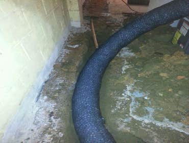 French Drain Installation We recently installed a french drain in a basement. Check out the before and after photos!