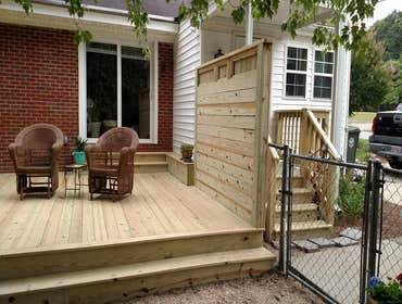Deck Construction with Privacy Fence I had a great time building this deck. Custom details include wrap around stairs, mitered edge board, bench seat a