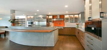 Photos by Kc Custom Builders #2 kitchen remodel with a new great room. We removed the interior load bearing walls, new roof, new windows and doors.