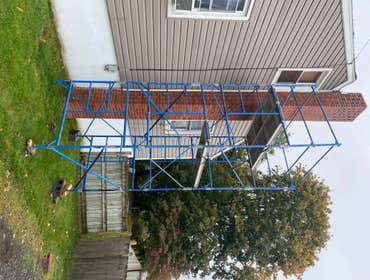 Photos by Prestige Costruction and Renovations Corp #21 demo old red brick chimney 26ft. Built new chimney out of concrete board/plywood and imitation 