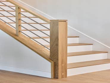 Photos by San Clemente Woodworking #1 Stainless Steel horizontal rods with our custom shadow posts. Clean lines and modern design.