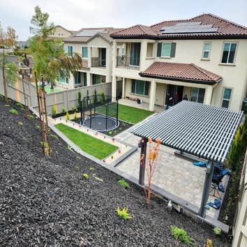 Photos by Reliable Landscaping & Design LLC #1 Full front yard renovation, Water feature , installation on Calstone Mission pavers , Installation of Ro