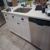 Kitchen cabinet refinish Cabinets went from black to these beautiful cupboards. This project took only a few days and the owner loves it!!