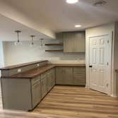 Basement Finishing W?W - this basement is a showstopper! Check out the beautiful wet bar ? with pantry; it is the highlight! ? This basement features a