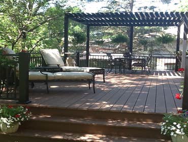 Photos by Custom Home Specialties Inc #2 Timber Tech maintenance free decks with powder coated railings.