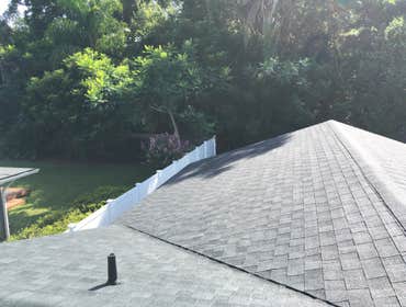Maitland, FL Residential Roof w/ Architectural Shingles & Flat Roof Section We recently completed this beautiful residential roofing project for a clie