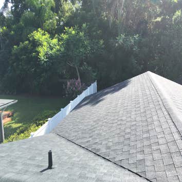 Maitland, FL Residential Roof w/ Architectural Shingles & Flat Roof Section We recently completed this beautiful residential roofing project for a clie