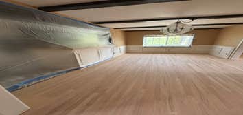 Photos by Floormasters & Design #1 Hardwood floor sanding and refinishing with some repairs.