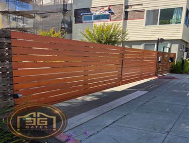 Steel & Clear Redwood Dual Swing Driveway Gate Installation in Oakland, Californ Custom steel & clear redwood dual swing automatic gate installation co