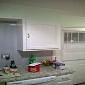 whole house remodel Kitchen remodel, resurfaced cabinets, tile backsplash, new vinyl plank flooring (click together), new custom toe kicks, transition 