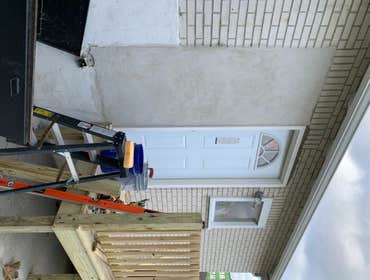 back door and stairs old sliding door had no header and was broken.
I had to installed metal lintel.
framed out opening for door, and install door.
I b