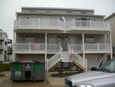 Photos by Saviors Custom Carpentry, Inc #1 Composite steps, vinyl railings & 1x4 azek