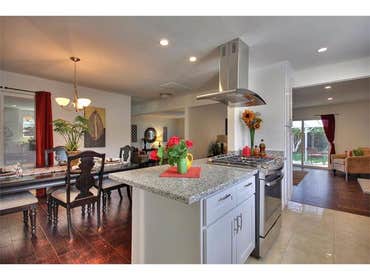 Photos by Roygbiv Construction LLC #1 Kitchen renovation- opening to dining area, creating an island counter top/bar - making the original tiny kitchen