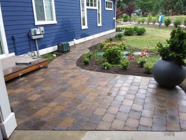 Photos by Rc Healthy Lawns #1 Full yard restoration pavers, retaining walls, vegetable gardens, flower beds, sod, shrugs ,plants and trees.
