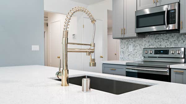 Kitchen Remodel with multicolored tile backsplash