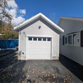 Grove Garage Welcome to our Grove Garage project, a 16′ x 22′ garage designed with careful attention to both function and regulatory requirements. Our 