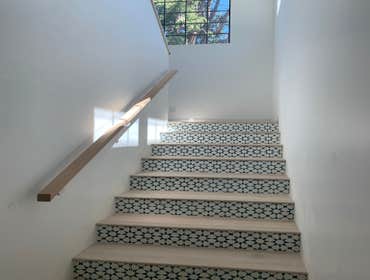 Photos by Tulip Remodeling #4 As part of this full home remodel, we designed this staircase to complement that natural light provided by the French win