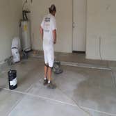 Champion Decor And Coatings LLC Garage floor with full broadcast vinyl chip, polyaspartic topcoat.