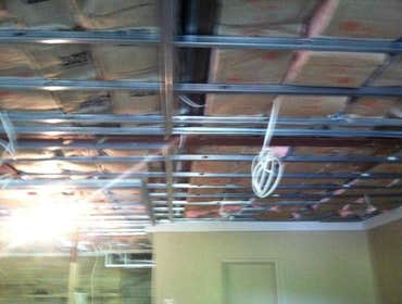 Job completed in New Jersey Install framing , insulation , and install 5/8 Sheetrock , priming the ceiling