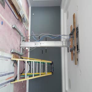 Recessed Electric lift projector installation