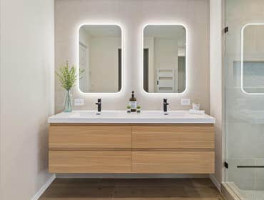 Photos by Certified Builders Inc #5 Steam shower, heated floors, back lit mirrors, heated towel rack, hidden tv, rain shower, custom niche, beautiful s