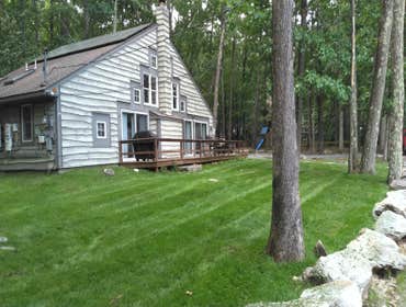 New Lawn & Low Boulder Wall
