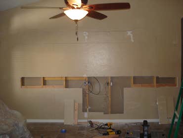 Photos from Love Remodeling Llc Built in custom entertainment center and custom oak floating shelves