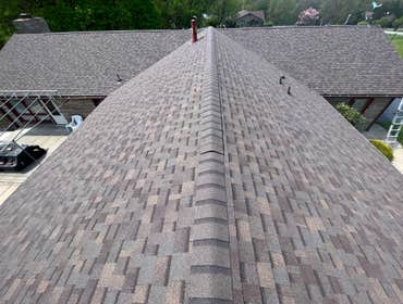 Photos by Altmire Roofing #1 Roofing, siding, and windows installations