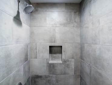 Custom Bathroom Remodel The minimalist appearance is both attractive and calming to the eye, making it an excellent choice for bathroom decor. Unclutte