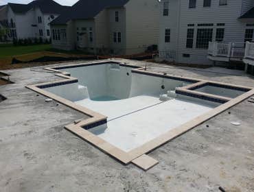 Photos from Crystal Blue Aquatics Llc New Construction of pool with full automation, LED lighting, high end travertine patio decking, beautiful water f
