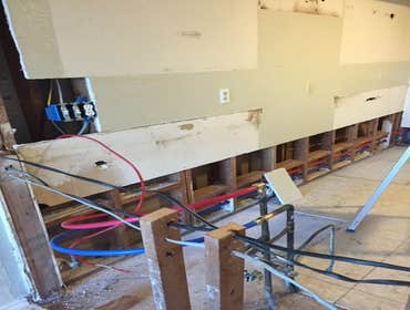 Wall Removal and Rerouting of elec. & vent