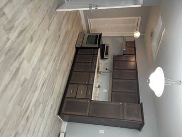 Photos by Medina's Construction & Landscaping LLC #1 Remodel entire interior and paint it. Also paint entire exterior of home.