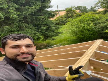 Photos by Us Success Properties LLC #1 Construction of a new roof structure over an existing residential deck. Scope of work included installation of s