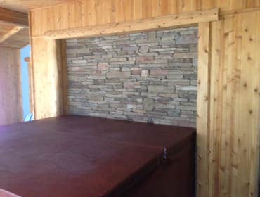 hot tub room and cedar porches Created updated curb appeal and room for relaxation in the hot tub. Addition features cedar T&G, custom trims and cultur