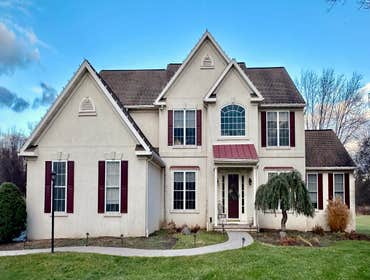 Before Stucco Remediation with New Siding and Stone – Phoenixville PA