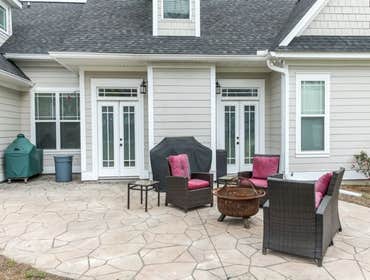 Photos by Stamped Concrete Denver LLC #1 Stamped concrete, often called textured or imprinted concrete, replicates the look of many different stones su
