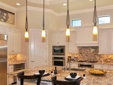 Kitchen Remodel Complete kitchen remodel with all upgraded granite tops and backsplash and new lighting.